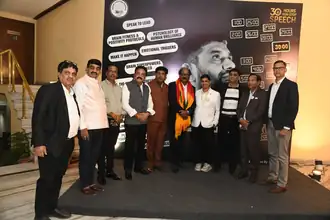 Dignitaries at the 30-hour non-stop speech backdrop