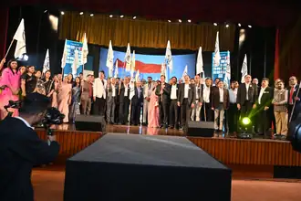 Flag ceremony on stage at the Jaipur Learning Festival